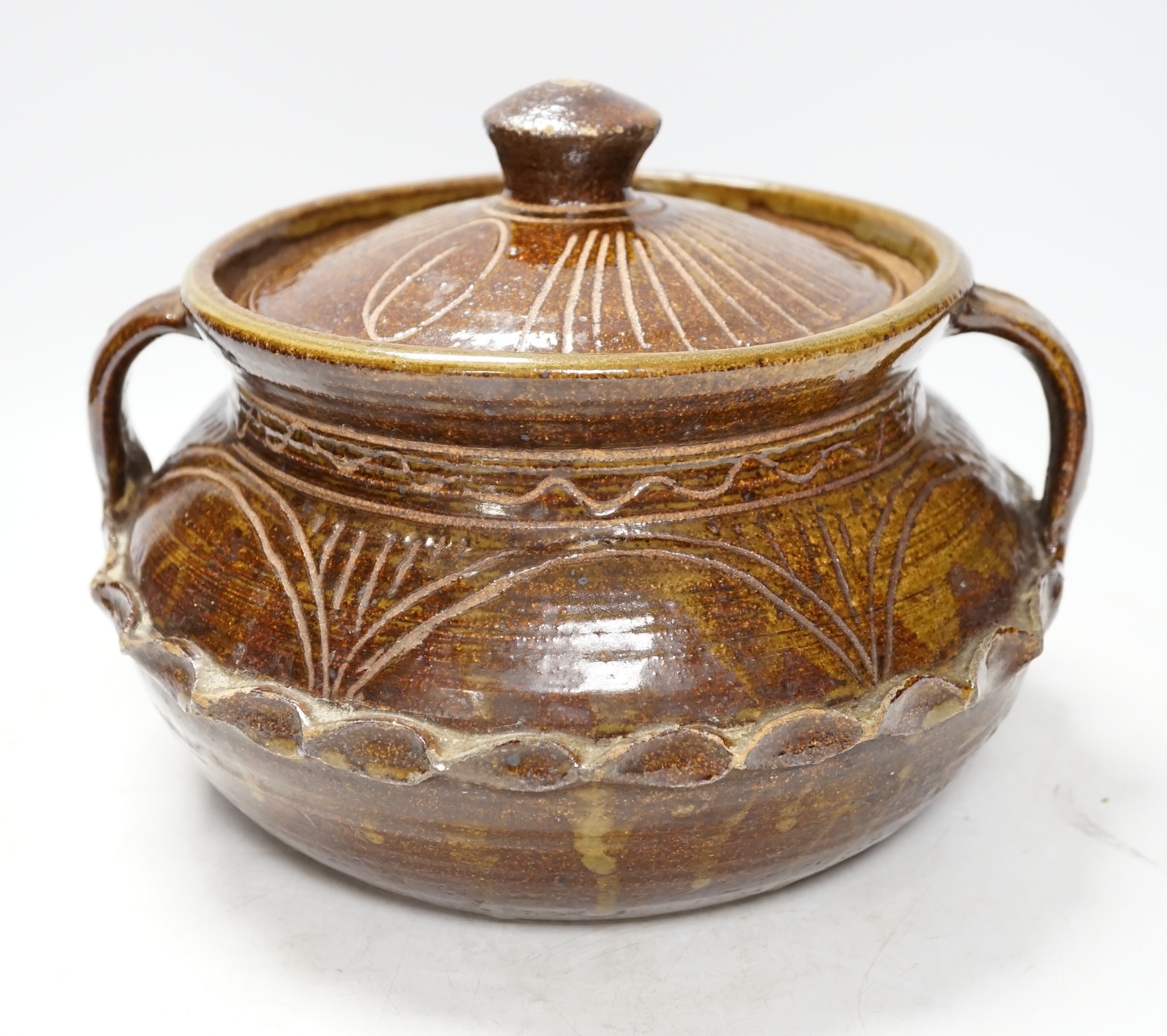 A Wenford Bridge stoneware jar and cover, Gwari, by Michael Cardew, 18cm. Condition - fair, some wear to glaze.